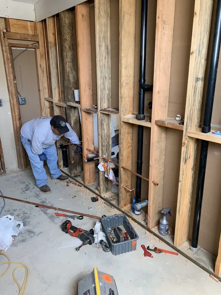 Commercial rough-in plumbing for Water Heater Replacement in Eastway - Albright